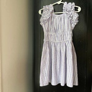 Ruffle sleeve smocked dress in a textured chambray